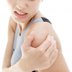 young woman shoulder in pain