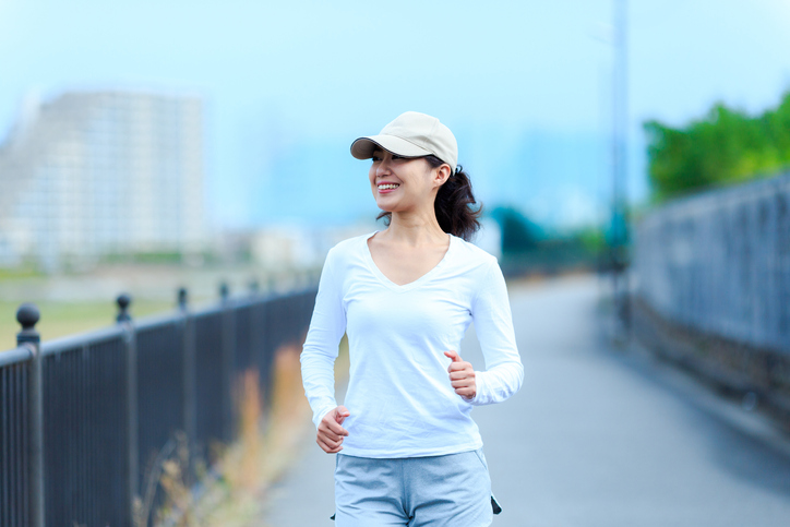healthy woman walking outdoors