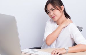 Woman has shoulder pain from work