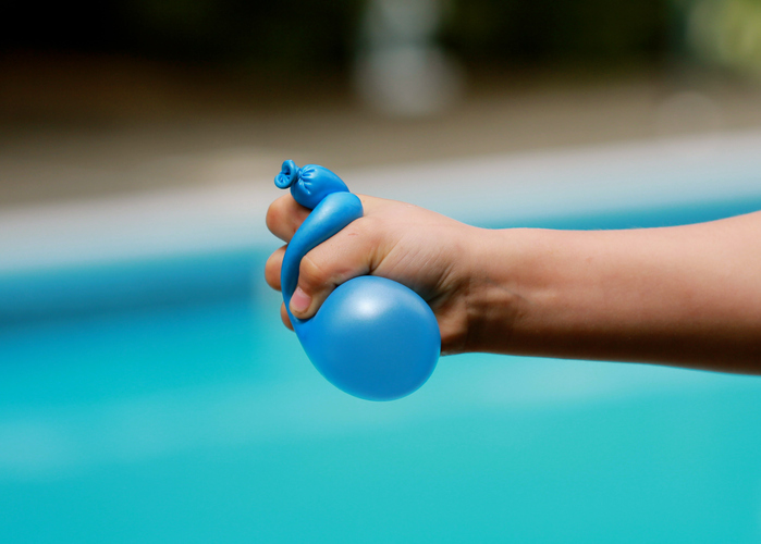 Water balloon in hand