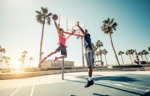 Friends playing basketball